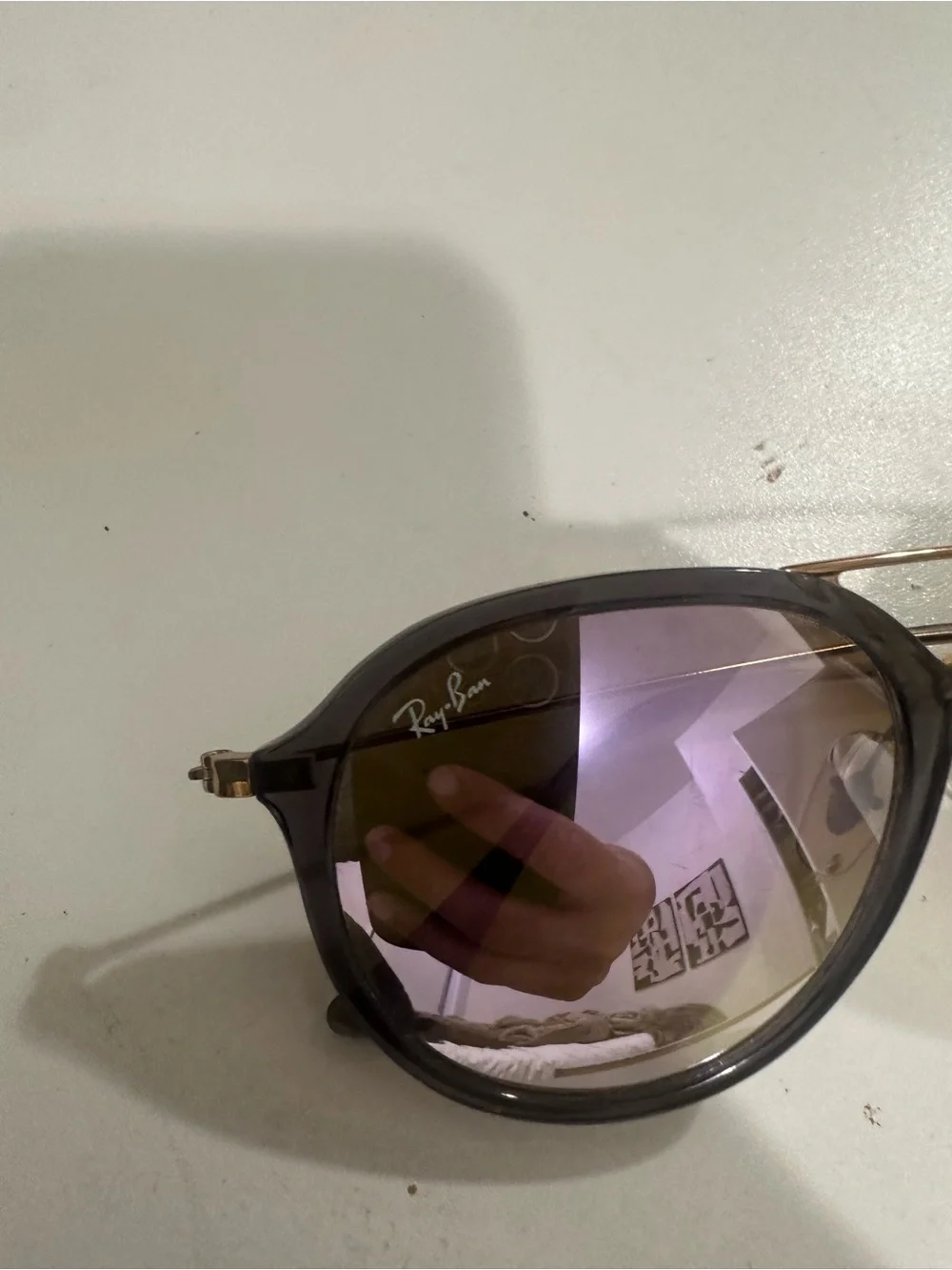 Ray-Ban Black Frame Sunglasses with Purple Mirrored Lenses